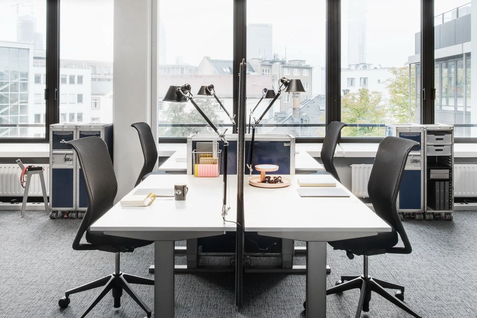 Office cleaning Belmont - modern clean desk workspace with city views serviced by Nexus Kleen